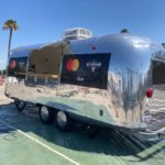 The Airstream trailer with a Mastercard/Uber logo on it