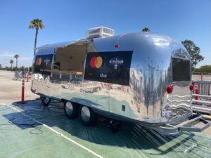 The Airstream trailer with a Mastercard/Uber logo on it