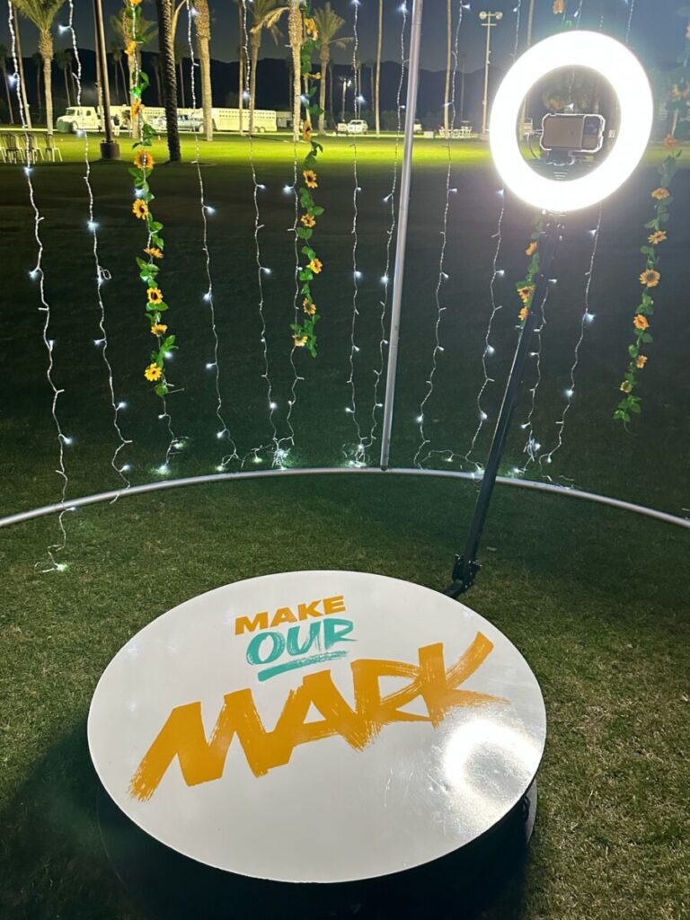 Coachella Party 360 photo booth with backdrop frame, lights and sunflower at Empire Polo Club, the Coachella Festival venue